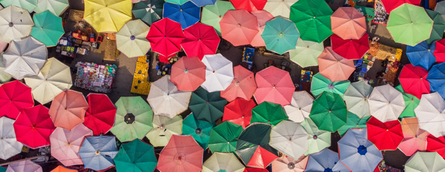 Collage of aerial view of umbrellas